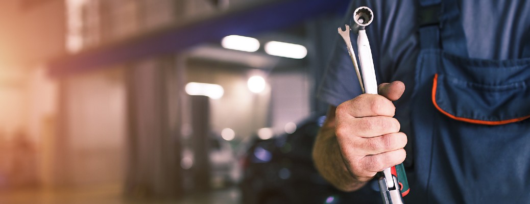 Closeup of person holding tools