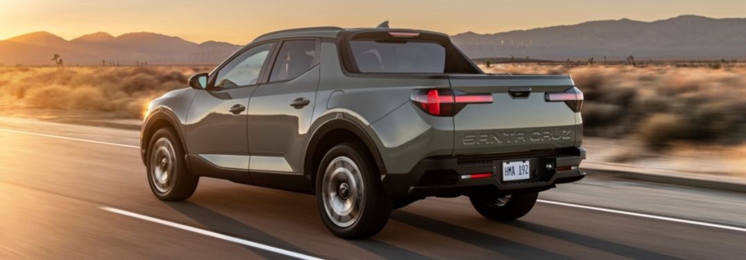 Gray 2022 Hyundai Santa Cruz Rear Exterior on a Desert Highway
