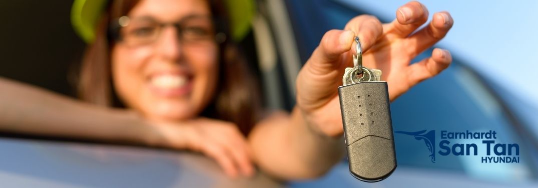 Close Up of Woman Holding Keys with San Tan Hyundai Logo